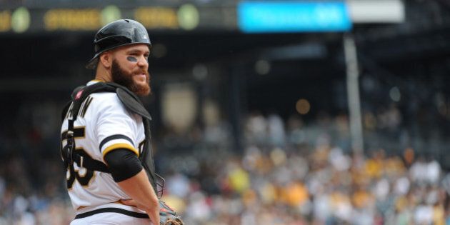 PITTSBURGH, PA - SEPTEMBER 21: Catcher Russell Martin of the Pittsburgh Pirates looks on from the field during a game against the Milwaukee Brewers at PNC Park on September 21, 2014 in Pittsburgh, Pennsylvania. The Pirates defeated the Brewers 1-0. (Photo by George Gojkovich/Getty Images)