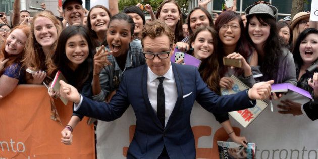 TORONTO, ON - SEPTEMBER 09: Actor Benedict Cumberbatch poses with fans at 'The Imitation Game' premiere during the 2014 Toronto International Film Festival at Princess of Wales Theatre on September 9, 2014 in Toronto, Canada. (Photo by George Pimentel/Getty Images)