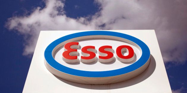 The Esso logo is seen displayed outside a gas station operated by Exxon Mobil Corp in Munich, Germany, on Monday, July 30, 2012. Exxon Mobil Corp., the world's biggest energy company by market value, is weighing a sale of its German Esso gas station chain, according to people familiar with the process. Photographer: Michael Nagle/Bloomberg via Getty Images