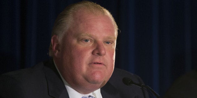 TORONTO, ON - SEPTEMBER 5: Rob Ford makes a point as John Tory looks on at the mayoral debate at the Royal Canadian Legion in Etobicoke. (Chris So/Toronto Star via Getty Images)