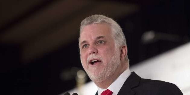 Quebec Liberal leader, Philippe Couillard(C), addresses the Board of Trade of Metropolitan Montreal April 1, 2014 in Montreal, Canada. The elections are scheduled for April 7, 2014. AFP PHOTO/Francois Laplante Delagrave (Photo credit should read Francois Laplante Delagrave/AFP/Getty Images)
