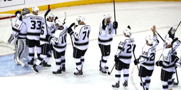NEW YORK, NY - JUNE 09: The Los Angeles Kings celebrate their 3-0 victory over the New York Rangers in Game Three of the 2014 NHL Stanley Cup Final at Madison Square Garden on June 9, 2014 in New York, New York. (Photo by Al Bello/Getty Images)