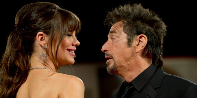 Al Pacino and Lucila Sola arrive for the screening of the movie 'Manglehorn' at the 71st edition of the Venice Film Festival in Venice, Italy, Saturday, Aug. 30, 2014. (AP Photo/Andrew Medichini)