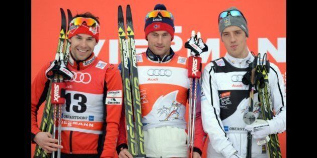 (L-R) Canadian Alex Harvey, Norwegian Petter Jr Northug and Swedish Calle Halfvarsson pose during the winner ceremony after the men's 15 kilometers pursuit classic style competition of the 'Tour de Ski' Cross Country World Cup on January 4, 2015 in Oberstdorf, southern Germany. Norway's Petter Jr Northug won the competition, Canadian Alex Harvey placed second and Swedish Calle Halfvarsson placed third. AFP PHOTO / CHRISTOF STACHE (Photo credit should read CHRISTOF STACHE/AFP/Getty Images)