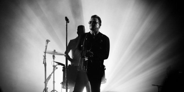GLASGOW, SCOTLAND - NOVEMBER 09: (EDITORS NOTE: Image has been converted to black and white) An alternative view of Bono of U2 during the MTV EMA's at The Hydro on November 9, 2014 in Glasgow, Scotland. (Photo by Gareth Cattermole/MTV 2014/Getty Images for MTV)