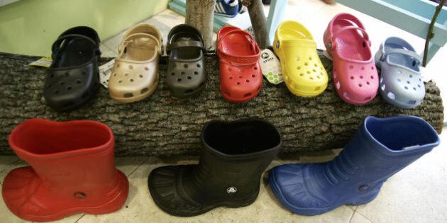 New York, UNITED STATES: A sample of Crocs shoes on display in a midtown New York City shoe store 21 February 2007. Crocs is an American company founded by Lyndon 'Duke' Hanson, Scott Seamans, and George Boedecker in July 2002 in Boulder, Colorado. Originally intended as a boating/outdoor shoe because of its slip-resistant, non-marking sole, crocs introduced its first model, the Beach at the Ft. Lauderdale Boat Show and has become one of the most trendy shoes in the United States. AFP PHOTO Timothy A. CLARY (Photo credit should read TIMOTHY A. CLARY/AFP/Getty Images)
