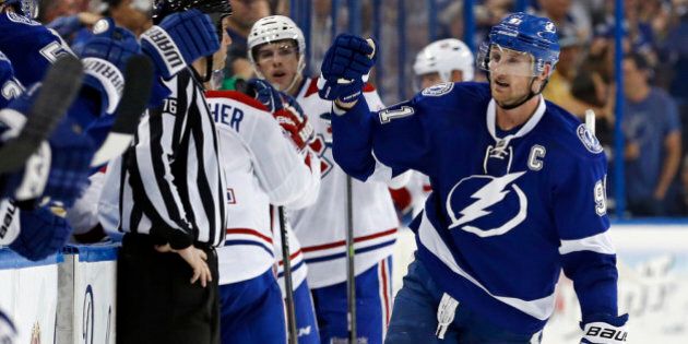 TAMPA, FL - APRIL 16: Steven Stamkos #91 of the Tampa Bay Lightning celebrates a goal against the Montreal Canadiens in Game One of the First Round of the 2014 Stanley Cup Playoffs at the Tampa Bay Times Forum on April 16, 2014 in Tampa, Florida. (Photo by Mike Carlson/Getty Images)