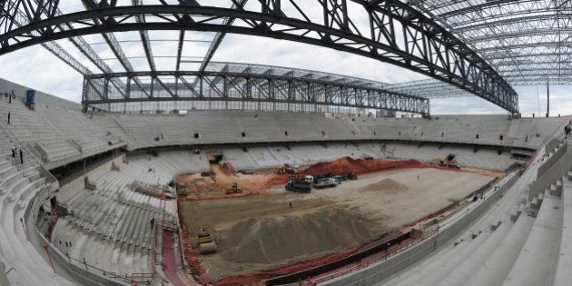 CURITIBA, BRAZIL - DECEMBER 14: Construction continues at the Arena da Baixada venue for the FIFA 2014 World Cup Brazil on December 14, 2013 in Curitiba, Brazil. (Photo by Shaun Botterill/Getty Images,)