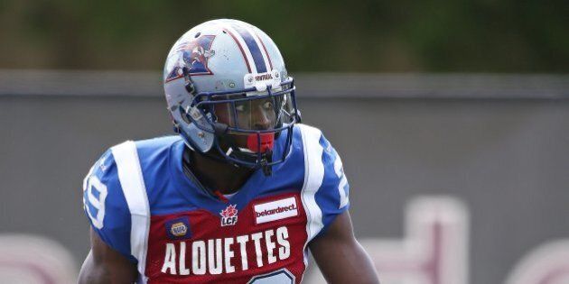 HAMILTON, ON - JUNE 14: Brandon Rutley #29 of the Montreal Alouettes runs the ball against the Hamilton Tiger-Cats during a pre-season CFL football game at Ron Joyce Stadium on June 14, 2014 in Hamilton, Ontario, Canada. The Tiger-Cats defeated the Alouettes 28-23. (Photo by Claus Andersen/Getty Images)