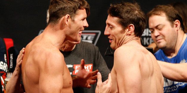 QUEBEC CITY, CANADA - APRIL 15: (L-R) Opponents Michael Bisping and Tim Kennedy face off during the TUF Nations Finale weigh-in at Colisee Pepsi on April 15, 2014 in Quebec City, Quebec, Canada. (Photo by Josh Hedges/Zuffa LLC/Zuffa LLC via Getty Images)