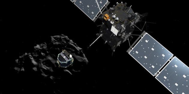 DARMSTADT, GERMANY - NOVEMBER 12: (EDITORIAL USE ONLY) In this November 12, 2014 handout photo illustration provided by the European Space Agency (ESA) the Philae lander (C) is pictured descending onto the 67P/Churyumov-Gerasimenko comet after a successful separation from the Rosetta probe. ESA will attempt to land the Philae lander onto the comet in the afternoon (GMT) of November 12 which, if successful, will be the first time ever that a man-made craft has landed onto a comet. The Philae lander, launched from the Rosetta probe, is a mini laboratory that will harpoon itself to the surface, though a problem with a gas thruster detected November 11 is making the outcome of the landing uncertain. (Photo ESA via Getty Images)