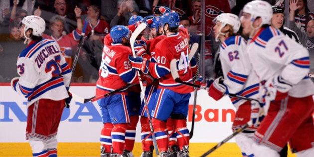 MONTREAL, QC - MAY 27: Rene Bourque #17 of the Montreal Canadiens celebrates his second period goal at 6:54 against the New York Rangers during Game Five of the Eastern Conference Final in the 2014 NHL Stanley Cup Playoffs at Bell Centre on May 27, 2014 in Montreal, Canada. (Photo by Richard Wolowicz/Getty Images)