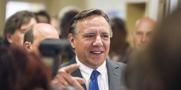 Coalition Avenir Quebec (CAQ) candidate Francois Legault arrives to vote on September 4, 2012 in l'Assomption, Quebec, Canada. Voting started Tuesday in a Quebec election expected to return separatists to power, buoyed by rising frustration with the current leadership and months of student protests over a planned tuition hike. Nearly six million voters in the country's only majority French-speaking province will choose 125 lawmakers. And pre-election polls point to the Parti Quebecois (PQ) coming out on top, though without a full majority. The PQ has been in the opposition since its 2003 defeat by the Liberals, led by Jean Charest, who is only the second person since the 1950s to have served three terms as Quebec premier. AFP PHOTO / ROGERIO BARBOSA (Photo credit should read ROGERIO BARBOSA/AFP/GettyImages)