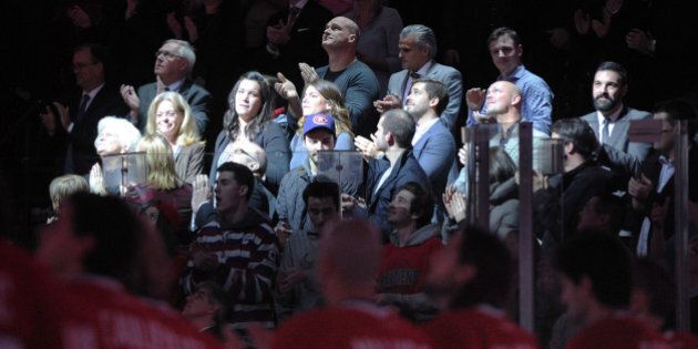 MONTREAL, QC - DECEMBER 9: Family members of the late Montreal Canadiens player Jean Beliveau during a ceremony prior to the during the NHL game between the Montreal Canadiens and the Vancouver Canucks at the Bell Centre on December 9, 2014 in Montreal, Quebec, Canada. (Photo by Richard Wolowicz/Getty Images)