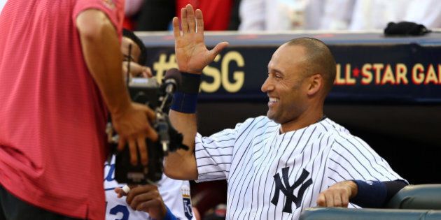 MINNEAPOLIS, MN - JULY 15: American League All-Star Derek Jeter #2 of the New York Yankees reacts after a home run by Miguel Cabrera in the first inning during the 85th MLB All-Star Game at Target Field on July 15, 2014 in Minneapolis, Minnesota. (Photo by Elsa/Getty Images)
