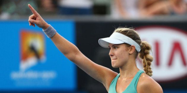 MELBOURNE, AUSTRALIA - JANUARY 15: Eugenie Bouchard of Canada celebrates winning her second round match against Virginie Razzano of France during day three of the 2014 Australian Open at Melbourne Park on January 15, 2014 in Melbourne, Australia. (Photo by Renee McKay/Getty Images)