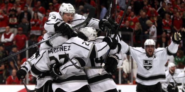 CHICAGO, IL - JUNE 01: The Los Angeles Kings celebrate defeating the Chicago Blackhawks 5 to 4 in overtime in Game Seven to win the Western Conference Final in the 2014 Stanley Cup Playoffs at United Center on June 1, 2014 in Chicago, Illinois. (Photo by Justin Heiman/Getty Images)