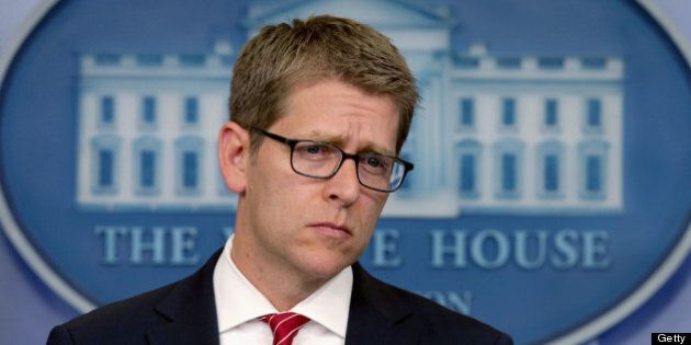 WASHINGTON, DC - MAY 15: White House Press Secretary Jay Carney takes questions from reporters during a press briefing in the Brady Press Briefing Room at the White House May 15, 2013 in Washington, DC. Carney faced more questions related to the Justice Department's subpeona of two months of Associated Press journalists' phone records, the Internal Revenue Services' scrutiny of conservative organization's tax exemption requests, and other topics. (Photo by Chip Somodevilla/Getty Images)