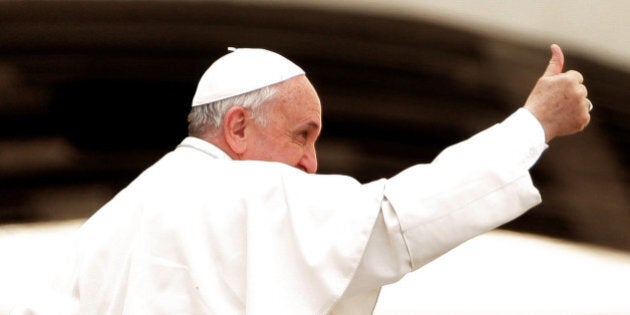 VATICAN CITY, VATICAN - APRIL 02: Pope Francis waves to the faithful as he leaves at the end of his weekly audience in St. Peter's Square on April 2, 2014 in Vatican City, Vatican. Tomorrow the Holy Father will receive Queen Elizabeth II and Prince Philip, Duke of Edinburgh. (Photo by Franco Origlia/Getty Images)