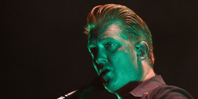 WELLINGTON, NEW ZEALAND - MARCH 20: Josh Homme of Queens of the Stone Age performs on stage at TSB Arena on March 20, 2014 in Wellington, New Zealand. (Photo by Hagen Hopkins/Getty Images)