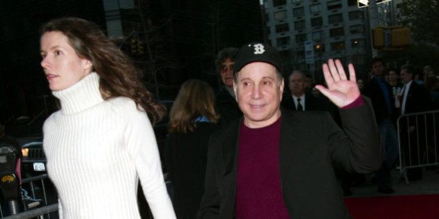 Paul Simon and Edie Brickell arriving at the New York Benefit Premiere of 'Enigma' at the Beekman Theatre in New York City. April 11, 2002. Photo: Evan Agostini/ImageDirect