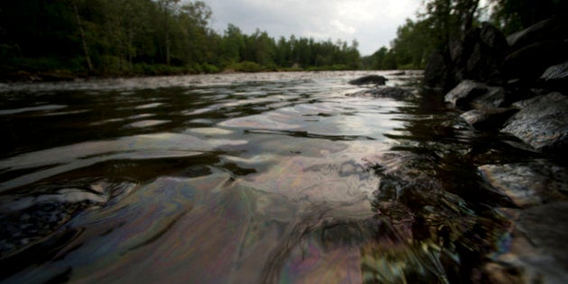 LAC-MEGANTIC QC - JULY 9: Crude oil from the Lac-MÈgantic spill flowed down the ChaudiËre River Tuesday afternoon threatening towns and ecosystems downstream. (Lucas Oleniuk/Toronto Star via Getty Images)