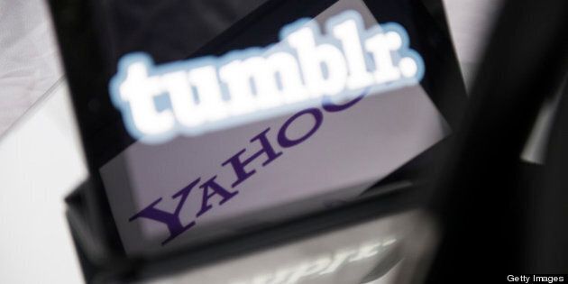 A picture taken on May 20, 2013 in Paris, shows logos of the brands Tumblr and Yahoo! on the screen of tablets. Yahoo! bought today the popular blogging platform Tumblr for $1.1 billion. AFP PHOTO / FRED DUFOUR (Photo credit should read FRED DUFOUR/AFP/Getty Images)