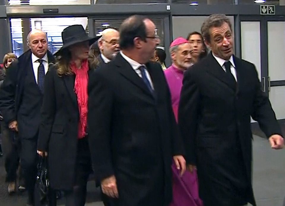 François Hollande et Nicolas Sarkozy arrivant ensemble au Soccer City