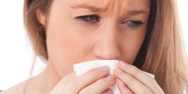 Sneezing Woman. (Photo by: Media for Medical/UIG via Getty Images)