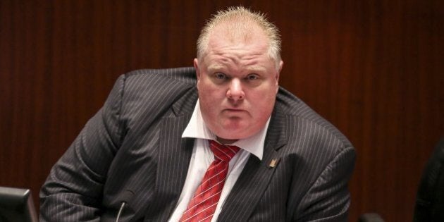 TORONTO, ON- NOVEMBER 18 - Mayor Rob Ford sits in as chair of the meeting while Speaker Frances Nunziata has a break as council debates the motion to limit the Mayors office budget., November 18, 2013. (David Cooper/Toronto Star via Getty Images)