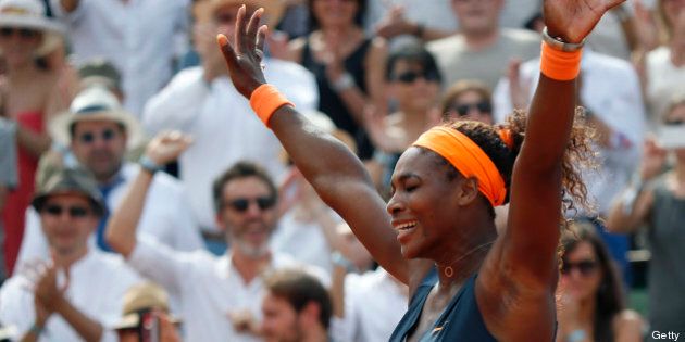USA's Serena Williams celebrates her victory over Russia's Maria Sharapova at the end of their French tennis Open final match at the Roland Garros stadium in Paris on June 8, 2013. AFP PHOTO / THOMAS COEX (Photo credit should read THOMAS COEX/AFP/Getty Images)
