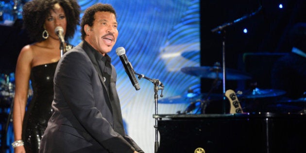 LOS ANGELES, CA - JANUARY 25: Lionel Richie performs onstage during the 56th annual GRAMMY Awards Pre-GRAMMY Gala and Salute to Industry Icons honoring Lucian Grainge at The Beverly Hilton on January 25, 2014 in Los Angeles, California. (Photo by Kevin Mazur/WireImage)