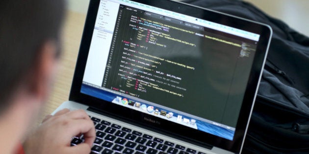 MIAMI, FL - FEBRUARY 01: A computer screen is filled with code as Dan Vera writes a program that he hopes will allow people living in Cuba to bypass the Cuban government censorship of the internet during the Hackathon for Cuba event on February 1, 2014 in Miami, Florida. The hackathon brought together experts and programmers to devise innovative technology solutions aimed at strengthening communications and information access in Cuba. The event is organized by Roots of Hope with support from the John S. and James L. Knight Foundation. (Photo by Joe Raedle/Getty Images)