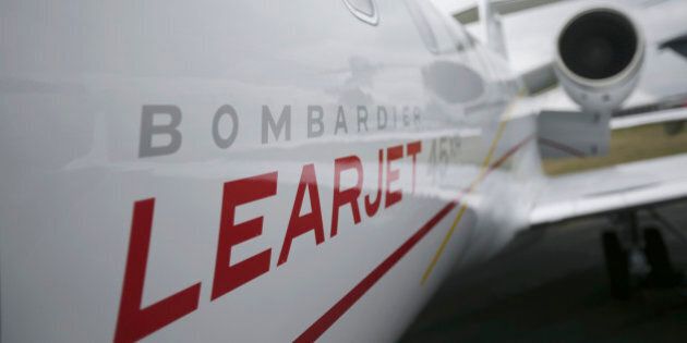 A logo sits on the side of a Learjet 45XR aircraft, manufactured by Bombardier Inc., on the second day of the Farnborough International Air Show in Farnborough, U.K., on Tuesday, July 10, 2012. The Farnborough International Air Show runs from July 9-15. Photographer: Matthew Lloyd/Bloomberg via Getty Images