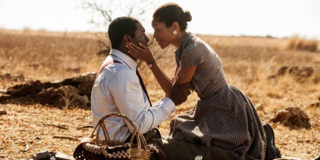UNSPECIFIED LOCATION, UNSPECIFIED DATE: In this handout photo provided by The Weinstein Compan, Idris Elba (L) and Naomie Harris are seen on the set of 'Mandela: Long Walk to Freedom'. (Photo by Keith Bernstein/The Weinstein Company via Getty Images)
