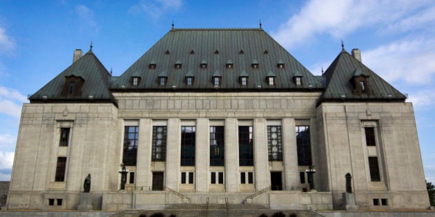 The Supreme Court of Canada stands in Ottawa, Ontario, Canada, on Wednesday, Aug. 10, 2011. Canada's trade deficit widened more than forecast in June, signaling that the economy may have stalled or even contracted in the second quarter. Photographer: Brent Lewin/Bloomberg via Getty Images