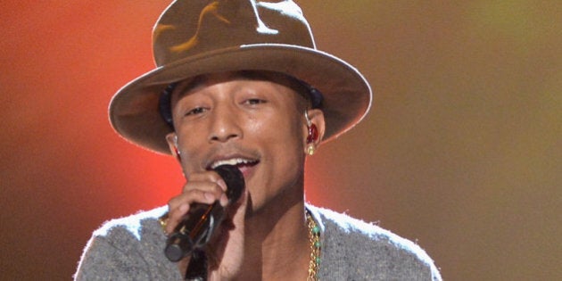 LOS ANGELES, CA - JANUARY 27: Recording artist Pharrell Williams performs onstage during 'The Night That Changed America: A GRAMMY Salute To The Beatles' at the Los Angeles Convention Center on January 27, 2014 in Los Angeles, California. (Photo by Kevin Winter/Getty Images for NARAS)