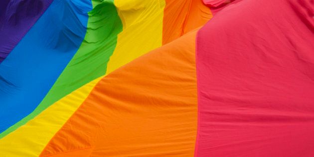 Rainbow Gay Pride Flag waves.
