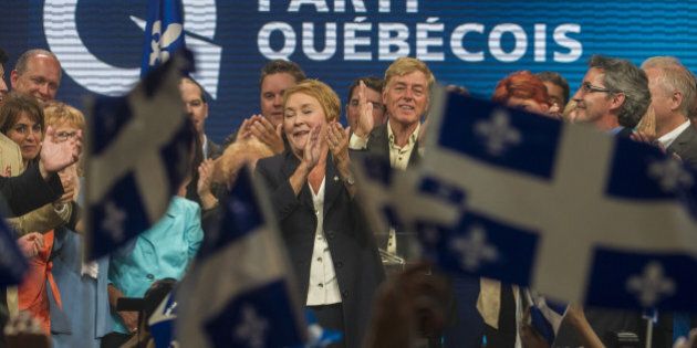 Pauline Marois, leader of the Parti Quebecois delivers her victory speech prior to a gunman opening fire on September 4, 2012 in Montreal. One person was killed and another seriously wounded when a gunman opened fire during the victory speech of Quebec's newly elected separatist premier, who was unharmed, police said. The shooting took place with Pauline Marois's Parti Quebecois projected to win Tuesday's elections in the mostly French-speaking province, ousting Premier Jean Charest from the legislature and his Liberals from power. AFP PHOTO / ROGERIO BARBOSA (Photo credit should read ROGERIO BARBOSA/AFP/GettyImages)