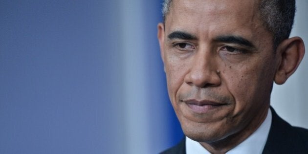 US President Barack Obama gives a press conference in the Brady Briefing Room at the White House in Washington on December 20, 2013. AFP PHOTO/Nicholas KAMM (Photo credit should read NICHOLAS KAMM/AFP/Getty Images)