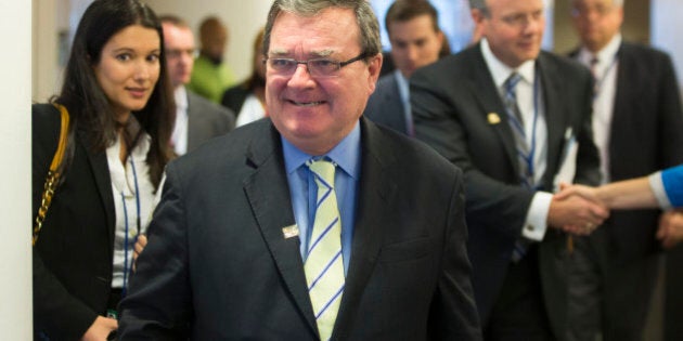 James 'Jim' Flaherty, Canada's finance minister, walks out following a news conference during the International Monetary Fund (IMF) and World Bank Group Annual Meetings in Washington, D.C., U.S., on Friday, Oct. 11, 2013. Global finance chiefs demanded the U.S. take 'urgent action' to resolve the political logjam threatening to trigger a default of the world's benchmark debt. Photographer: Andrew Harrer/Bloomberg via Getty Images