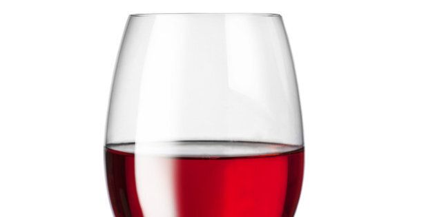 isolated glass with red wine