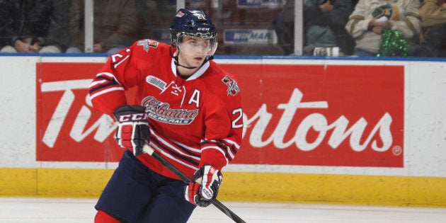 LONDON, ON - OCTOBER 18: Scott Laughton #21 of the Oshawa Generals skates with the puck against the London Knights during an OHL game at the Budweiser Gardens on October 18, 2013 in London, Ontario, Canada. The Generals defeated the Knights 5-3. (Photo by Claus Andersen/Getty Images)