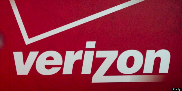 The Verizon Communications Inc. logo is seen at the International Consumer Electronics Show (CES) in Las Vegas, Nevada, U.S., on Thursday, Jan. 12, 2012. The 2012 CES trade show, which runs through Jan 13, features more than 2,700 global technology companies presenting consumer tech products and is expected to draw over 140,000 attendees. Photographer: Andrew Harrer/Bloomberg via Getty Images