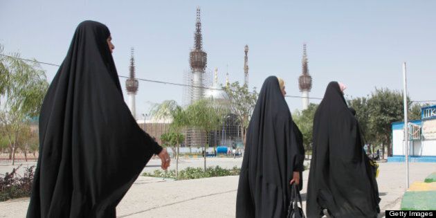 TEHRAN, IRAN - AUGUST 14: Iranian women in chadors walk at the Holy Shrine mausoleum of Ayatollah Khomeini on August 14, 2012 in Tehran, Iran. (Photo by Franco Czerny/Getty Images)