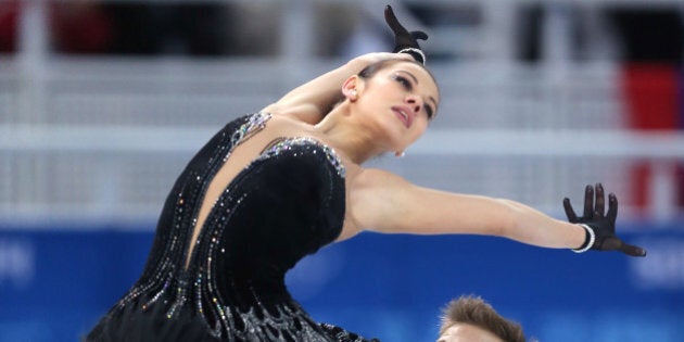 SOCHI, RUSSIA - FEBRUARY 09: Elena Ilinykh and Nikita Katsalapov of Russia compete in the Team Ice Dance Free Dance during day two of the Sochi 2014 Winter Olympics at Iceberg Skating Palace onon February 9, 2014 in Sochi, Russia. (Photo by Matthew Stockman/Getty Images)