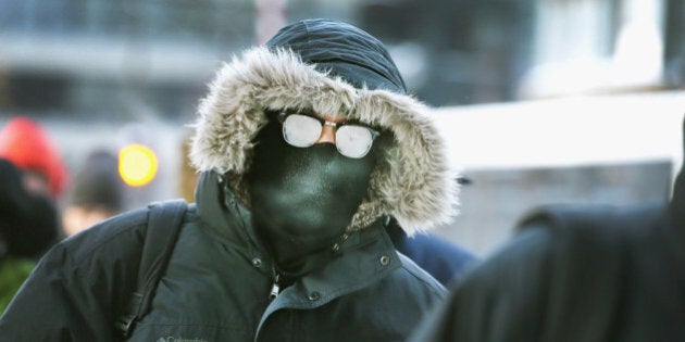 CHICAGO, IL - JANUARY 06: Commuters make a sub-zero trek to offices in the Loop on January 6, 2014 in Chicago, Illinois. Temperatures in the city dipped to -16 degree Fahrenheit this morning on the heals of a polar vortex that has swept into the Midwest bringing with it dangerously cold temperatures not seen in the area in about 20 years. (Photo by Scott Olson/Getty Images)