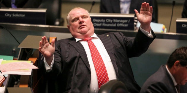 TORONTO, ON - NOVEMBER 18: Mayor Rob Ford has been reduced to the role of a figurehead, losing most of his powers and budget. In yet another unprecedented move, on Monday council approved a series of steps that transfer a significant chunk of the mayors budget and many of his powers to Deputy Mayor Norm Kelly. Toronto, November 18, 2013. (David Cooper/Toronto Star via Getty Images)