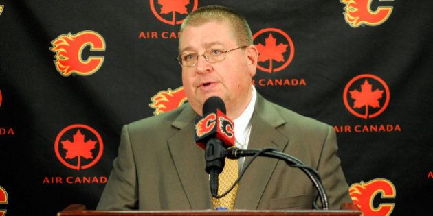 CALGARY, CANADA - JANUARY 12: Calgary Flames General Manager Jay Feaster addresses the media after trading Rene Bourque, a second round pick and prospect Patrick Holland to the Montreal Canadiens for Michael Cammalleri, a 5th round pick and prospect Kari Ramo on January 12, 2012 at the Scotiabank Saddledome in Calgary, Alberta, Canada. (Photo by Terence Leung/NHLI via Getty Images)
