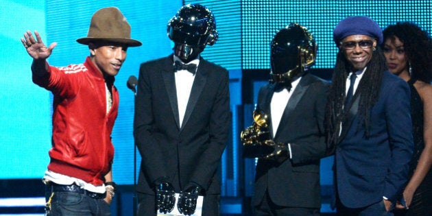 LOS ANGELES, CA - JANUARY 26: (L-R) Musicians Pharrell Williams, Thomas Bangalter and Guy-Manuel de Homem-Christo of Daft Punk, and Nile Rodgers accept the Best Pop Duo/Group Performance award for 'Get Lucky' onstage during the 56th GRAMMY Awards at Staples Center on January 26, 2014 in Los Angeles, California. (Photo by Kevork Djansezian/Getty Images)